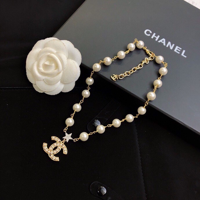 Ch*el brooches